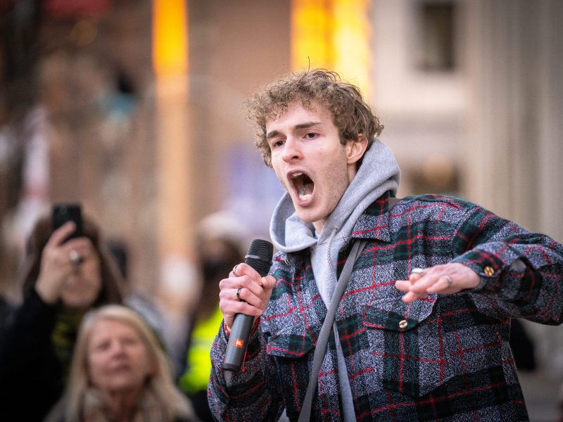 Avery Misterka, a member of the Towson University chapter of Jewish Voice for Peace protests in front of the Pratt Library in Baltimore, MD on March 17, 2025. Photo by Ryan Harvey/@rebellensbmore