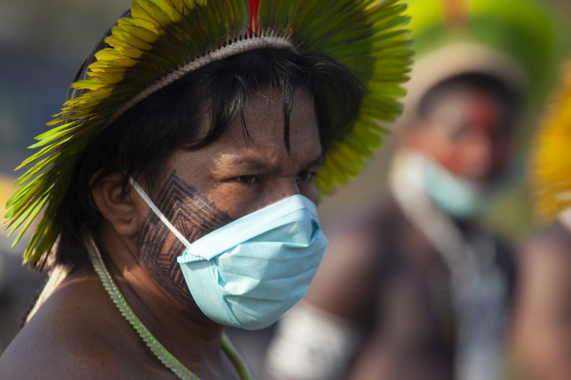 Kayapó indigenous people from the Baú and Menkragnoti villages, near the city of Novo Progresso, in the south of Pará, Brazil, on August 17, 2020, block the BR-163 highway in protest against the lack of resources to combat COVID-19. Photo by Ernesto Carriço/NurPhoto via Getty Images