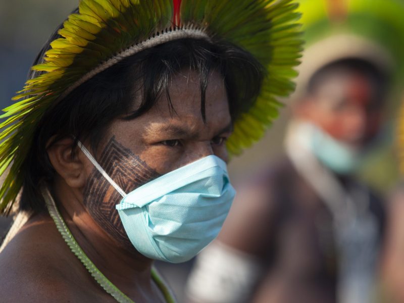 Kayapó indigenous people from the Baú and Menkragnoti villages, near the city of Novo Progresso, in the south of Pará, Brazil, on August 17, 2020, block the BR-163 highway in protest against the lack of resources to combat COVID-19. Photo by Ernesto Carriço/NurPhoto via Getty Images