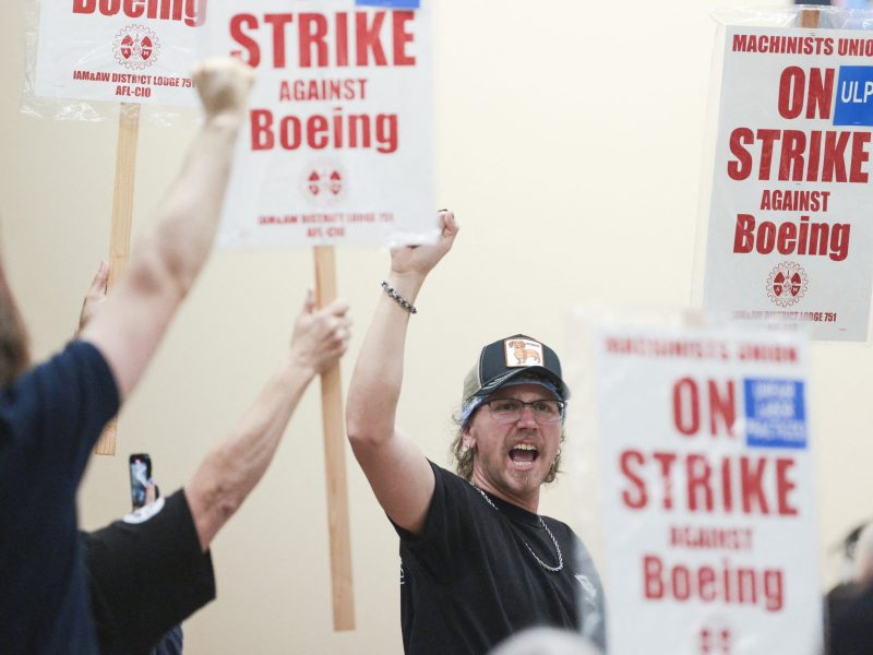 Union members react as Aerospace Machinists District 751 President Jon Holden announces that union members rejected a proposed Boeing contract and will go on strike, following voting results at their union hall in Seattle, Washington, on September 12, 2024. Photo by JASON REDMOND/AFP via Getty Images