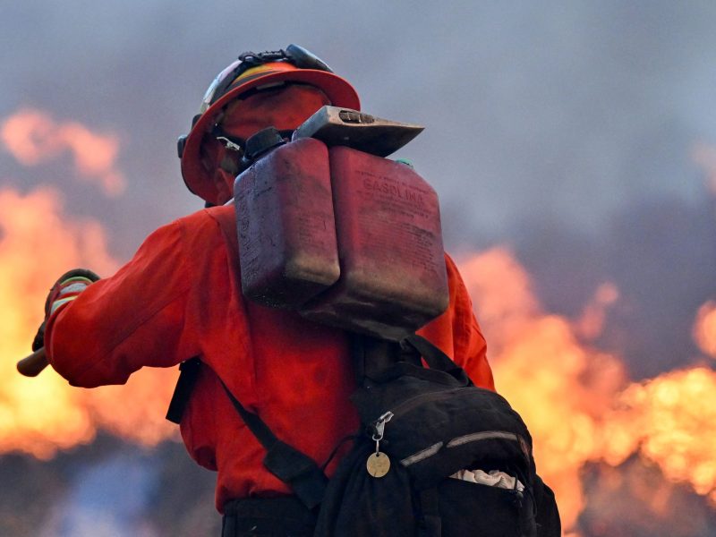 An inmate crew led by firefighters light backfires as they fight the Hughes Fire near Castaic, a northwestern neighborhood of Los Angeles County, California, January 22, 2025. Photo by ROBYN BECK/AFP via Getty Images