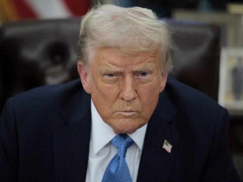 President Donald Trump talks to reporters after signing an executive order, "Unleashing prosperity through deregulation," in the Oval Office on January 31, 2025 in Washington, DC. Photo by Chip Somodevilla/Getty Images