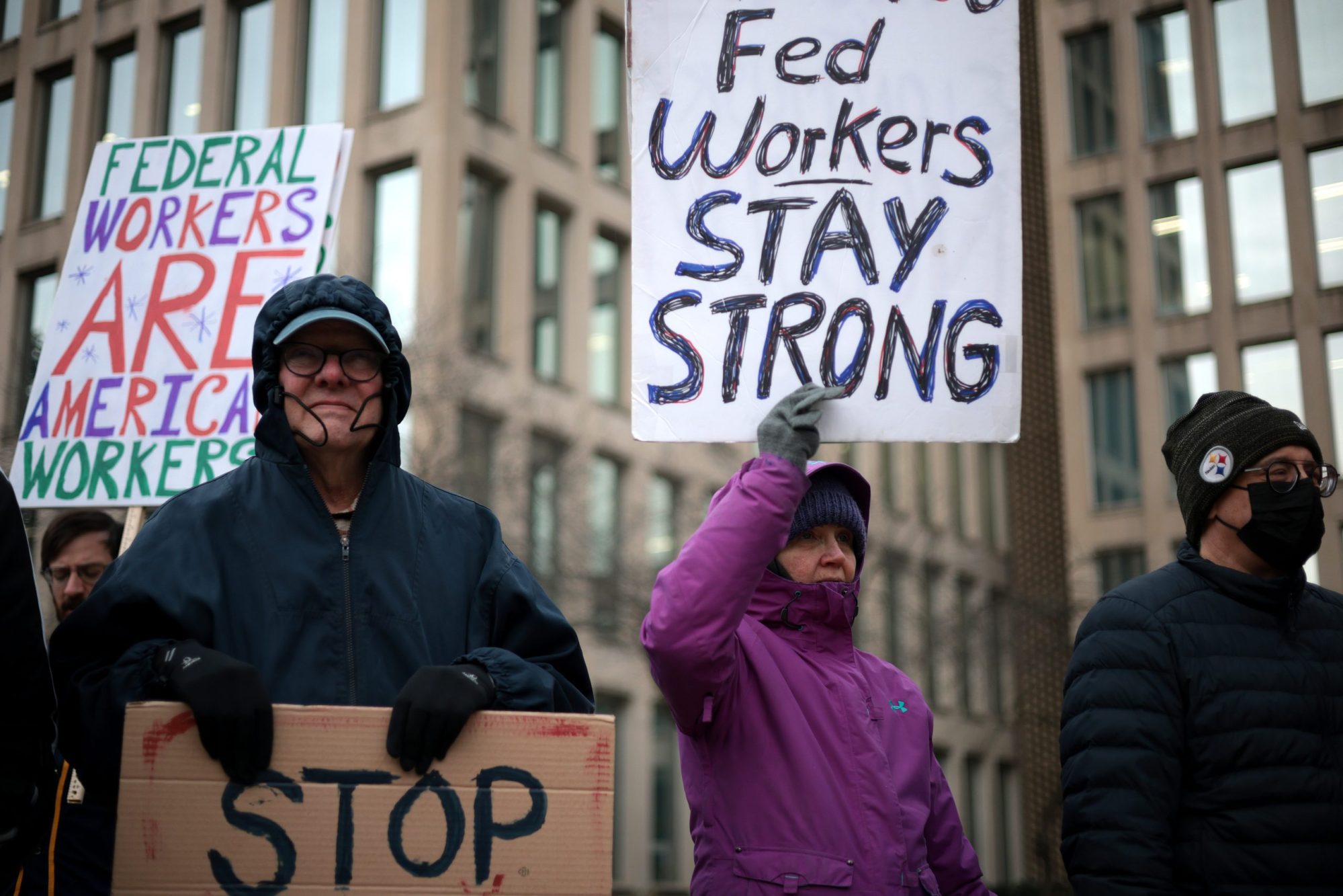 Protesters rally outside of the Theodore Roosevelt Federal Building headquarters of the U.S. Office of Personnel Management on February 05, 2025 in Washington, DC. Photo by Alex Wong/Getty Images