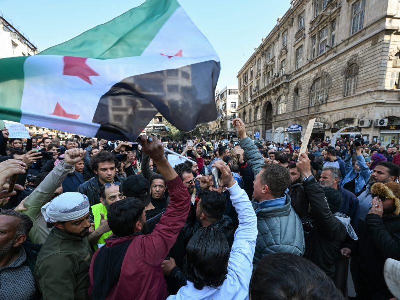 People chant slogans during a rally called for by Syrian activists and civil society representatives "to mourn for the civilian and security personnel casualties", at al-Marjeh square in Damascus on March 9, 2025. Photo by -/AFP via Getty Images
