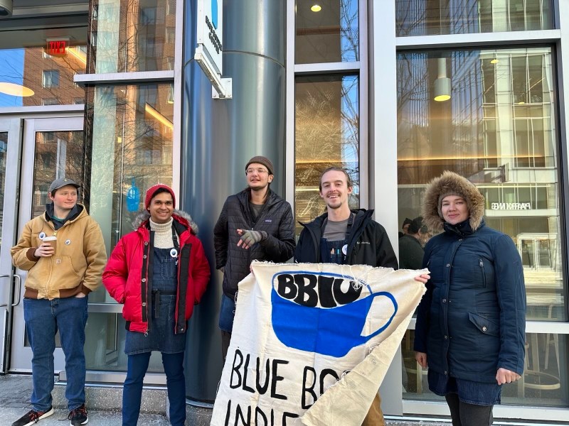 Members of Blue Bottle Independent Union stand together on a picket line during a walkout at one of their Boston-area locations on Jan 25.