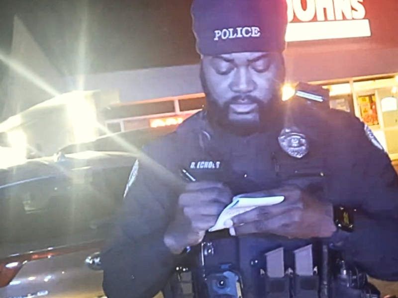 Jonesboro Arkansas police officer writes down information of pizza delivery driver during traffic stop. Photo: courtesy of Christian Mobley